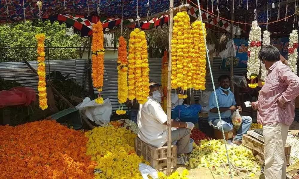 Costly flowers go beyond reach of many devotees