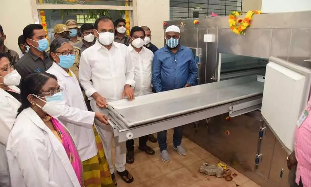 MLA Bhumana Karunakar Reddy inaugurating body freezers at Ruia hospital in Tirupati on Saturday. Hospital Superintendent Dr T Bharathi is also seen