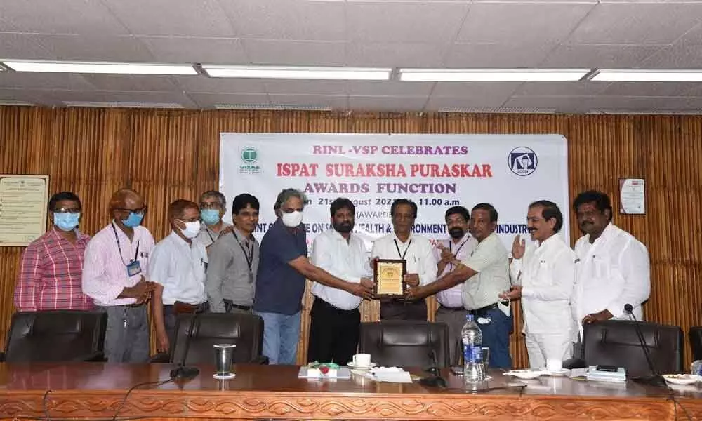 RINL personnel receiving Ispat Suraksha Puraskar Awards at a programme held in Visakhapatnam on Saturday