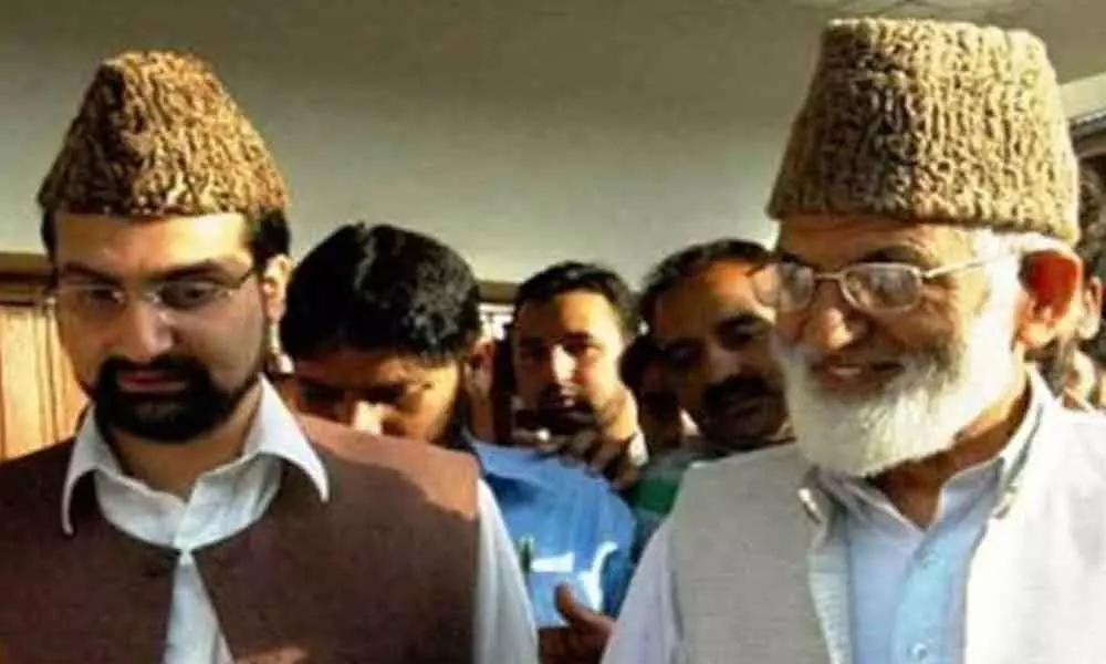 Hurriyat leaders Syed Ali Shah Geelani and Mirwaiz Umar Farooq