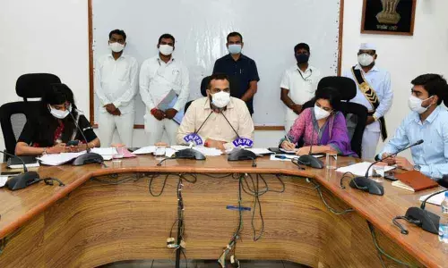 District Collector RV Karnan conducting a meeting on the Dalit Bandhu scheme with bank officials, RTO officers and scheme implementation officers in Karimnagar on Monday