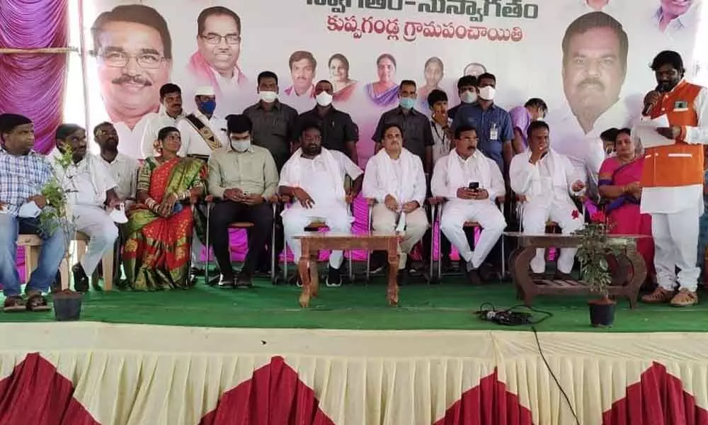 Agriculture Minister S Niranjan Reddy with others in Wanaparthy on Tuesday