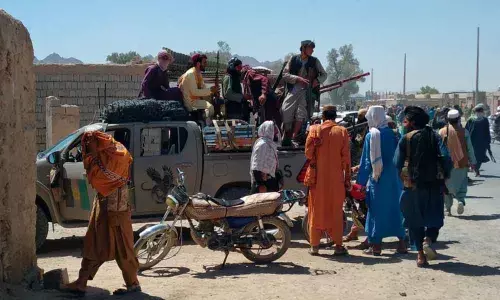 Taliban fighters inside the city of Farah, capital of Farah province southwest of Afghanistan. (AP)
