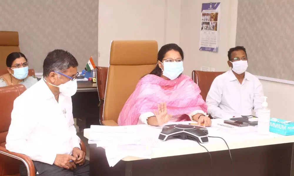 District Collector K Nikhila conducting a review meeting in Jangaon on Wednesday