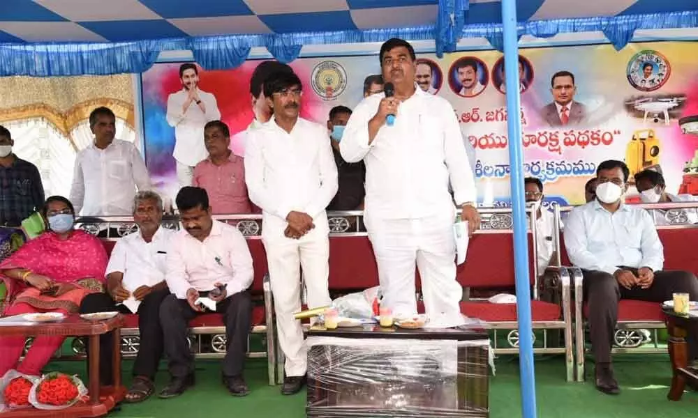 Deputy Chief Minister Dharmana Krishna Das addressing a meeting at Mannangidinne village in Kavali rural Mandal on Thursday