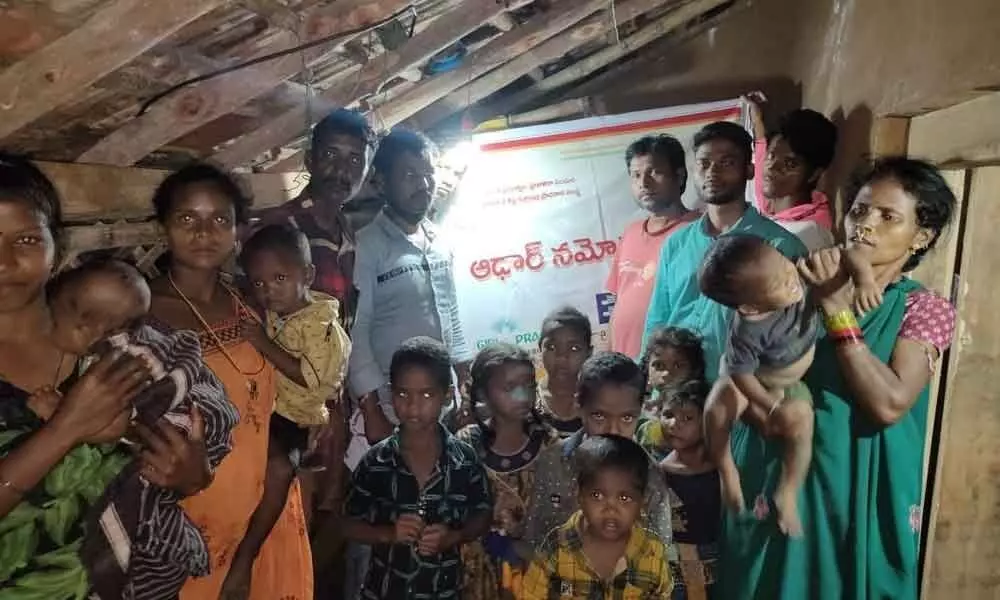 Children of Neredubanda at a mobile Aadhaar centre in Visakhapatnam on Thursday