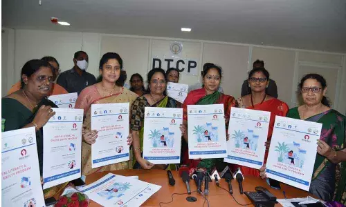 Home Minister Mekathoti Sucharita, AP Mahila Commission Chairperson Vasireddy Padma and others releasing posters on the e-Nari Month programme in Mangalagiri on Thursday