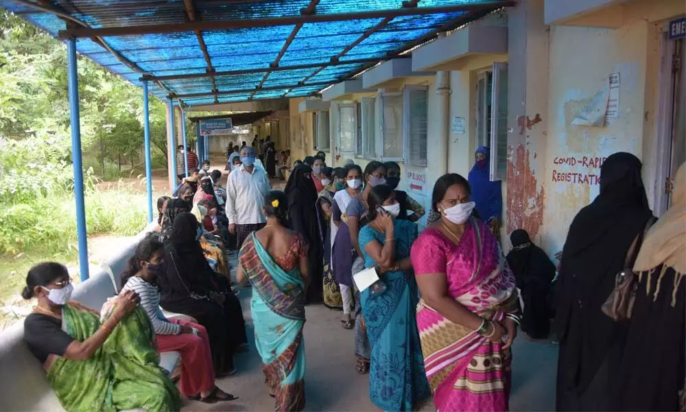Out-patients swell at Nallakunta Fever Hospital with the spreading of seasonal viral fevers in the city on Friday. Photo: Srinivas Setty