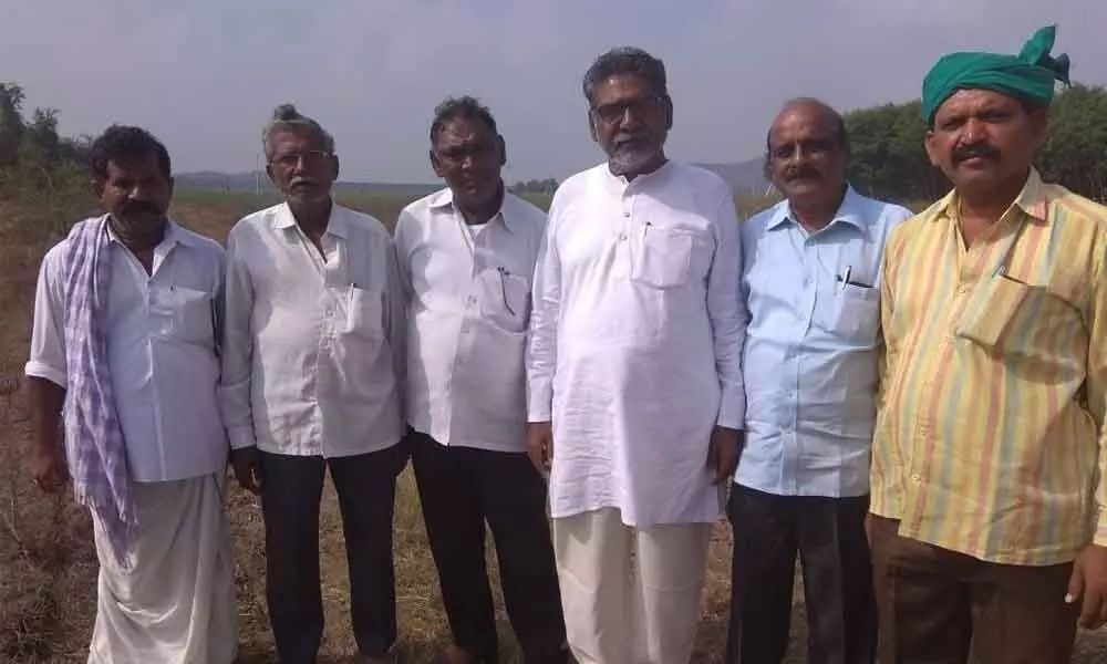 Farmers leaders inspecting irrigation canals under NSP Right Canal in Prakasam district recently