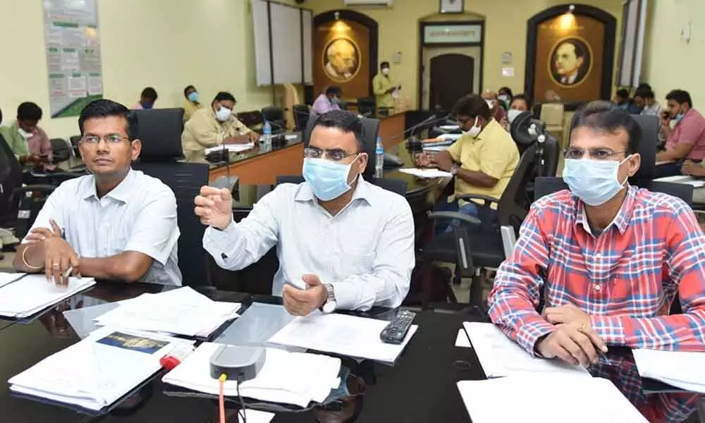 District Collector Vivek Yadav conducting a videoconference with RDOs and tahsildars in Guntur on Friday.