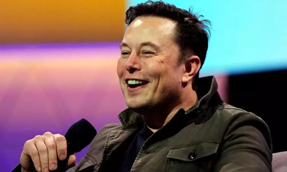 Elon Musk, 50, is the CEO of Tesla and SpaceX.