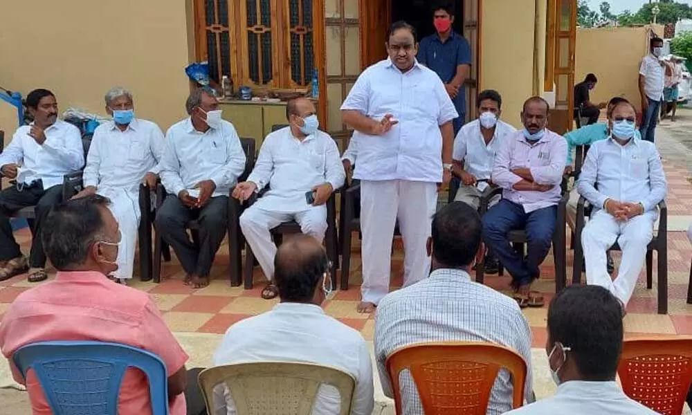 MLA V Sathish Kumar addressing TRS workers at Dharmarajupalli in Huzurabad mandal in Karimnagar district on Saturday