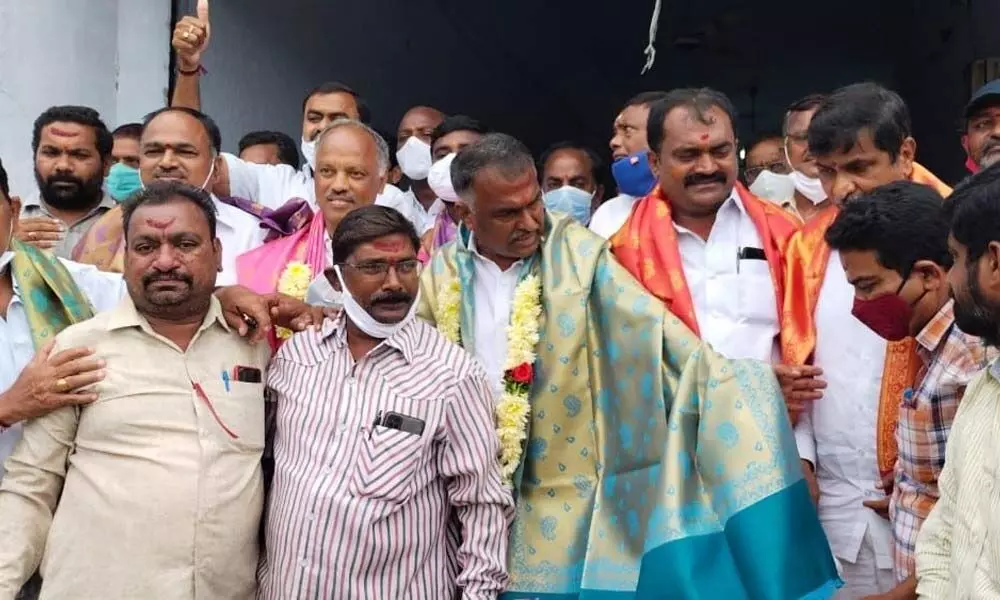 Members of Bommineni Panel celebrate after clinching Warangal Chamber of Commerce polls on Saturday