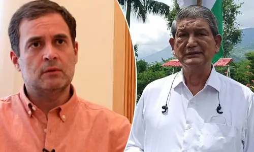 Rahul Gandhi and Harish Rawat