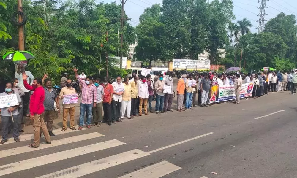 Scores take part in 20km long human chain in protest against privatisation of Vizag steel plant