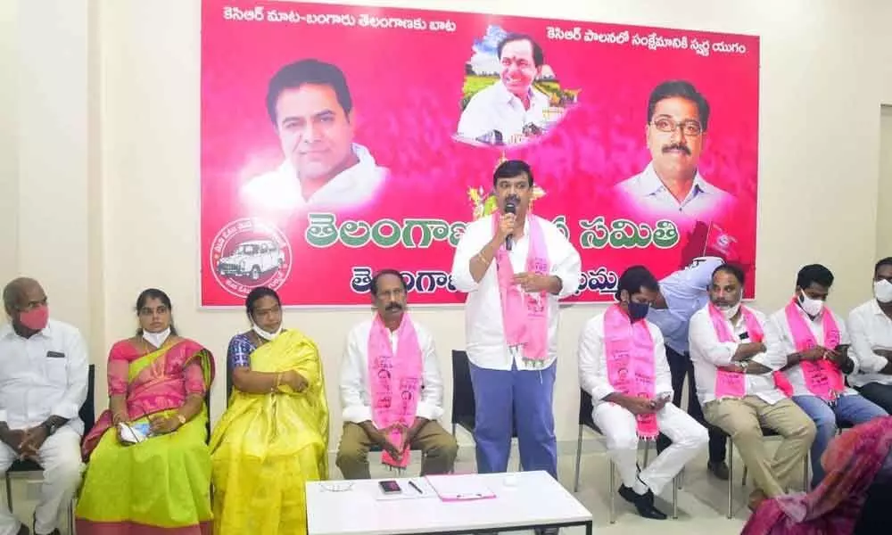 TRS district party office in-charge RJC Krishna speaking at a meeting at TRS Bhavan in Khammam on Sunday