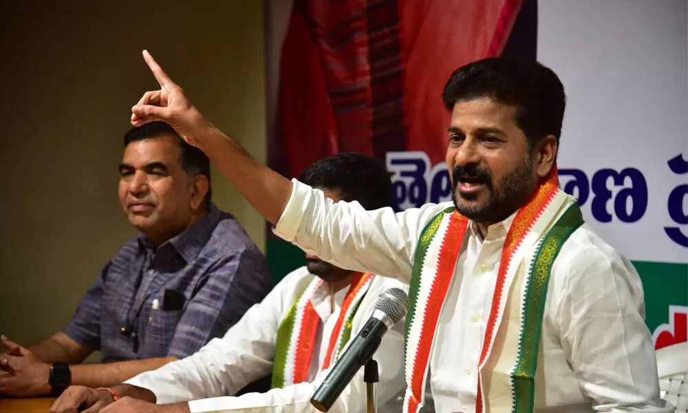 TPCC chief A Revanth Reddy speaking at a meeting of party workers of Bodhan constituency in Kompally on Sunday