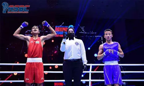 Indias Rohit Chamoli (in red) celebrates his win against Mongolia’s Otgonbayar Tuvshinzaya in their final bout at the ASBC Asian Junior Boxing Championships in Dubai on Sunday