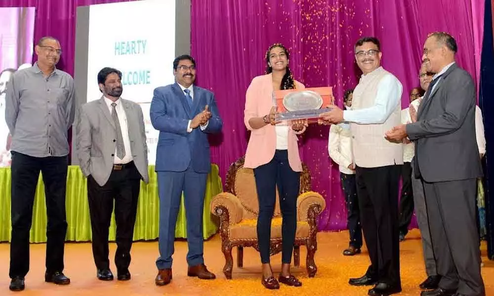 Badminton ace PV Sindhu being felicitated by the RINL personnel in Visakhapatnam on Monday