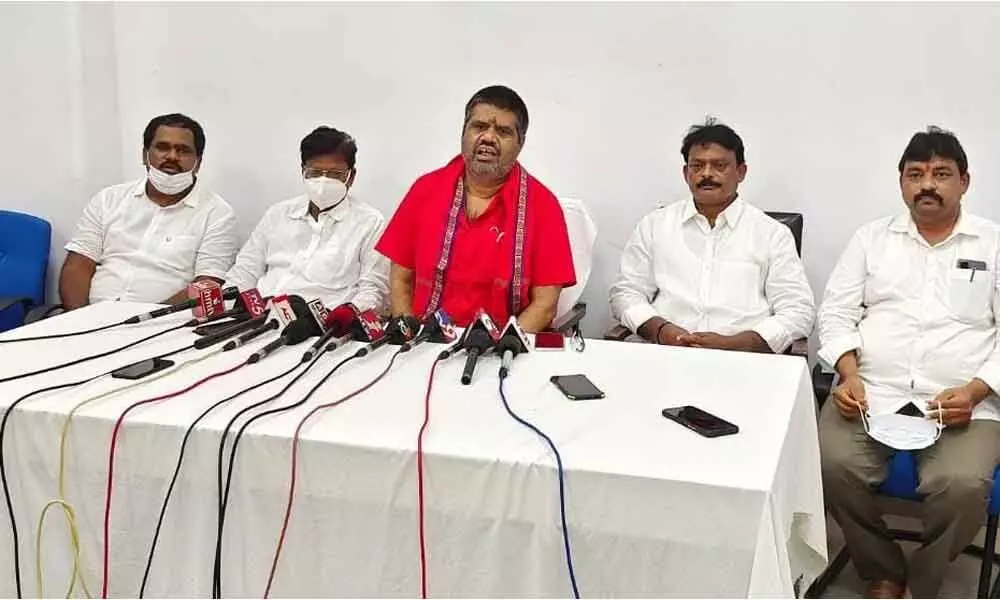 Tourism Minister M Srinivasa Rao addressing a press conference in Visakhapatnam on Monday