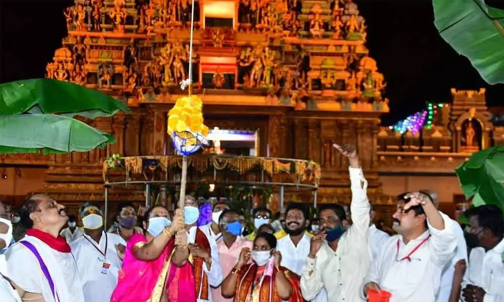 Sri Durga Malleswara Swamy temple EO D Bhramaramba and others taking part in Sri Krishna Janmashtami celebrations on Indrakeeladri in Vijayawada on Monday