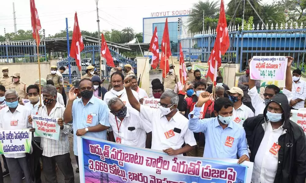 CPM activists staging dharna at Vidyut Soudha in Vijayawada on Tuesday