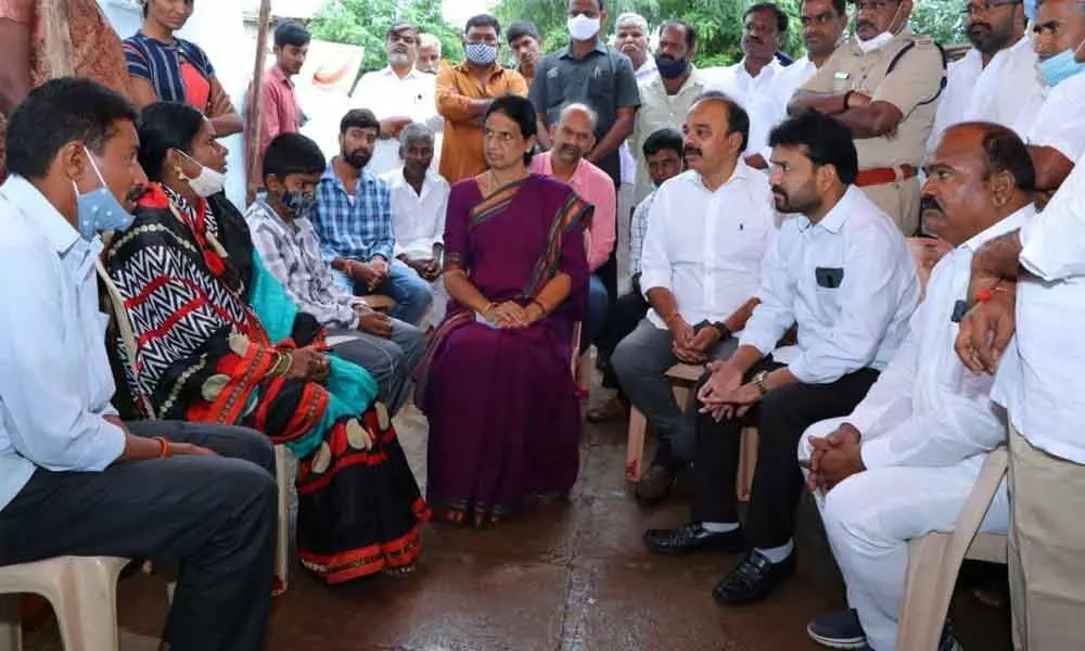 Education Minister Sabitha Indra Reddy consoling the family members of Pravallika, who died in a car accident, on Tuesday