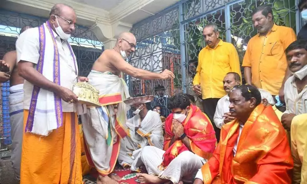 Priests giving blessings to TDP national general secretary Nara Lokesh at Lord Rama Temple in Bhadrachalam on Tuesday