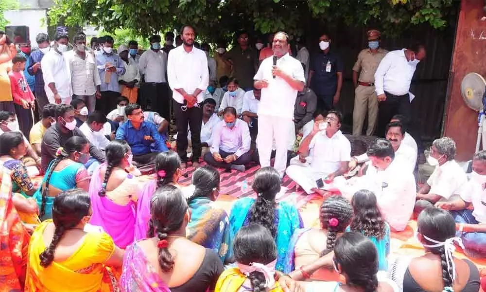 Minister Koppula Eshwar addressing Dalits at Krishna Colony in Huzurabad on Wednesday