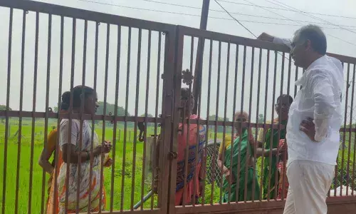 Finance Minister T Harish Rao interacting with women at Borlakunta in Huzurabad municipality on Wednesday