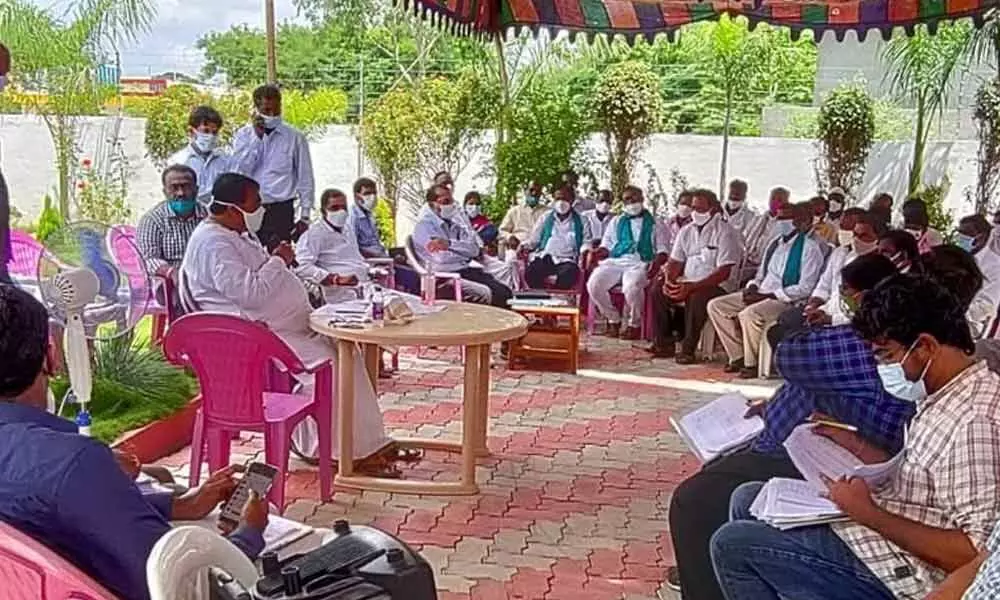 Speaker Pocharam Srinivas Reddy holding a review meeting with officials, public representatives and RWS officials on the drinking water issues in Banswada mandal on Thursday