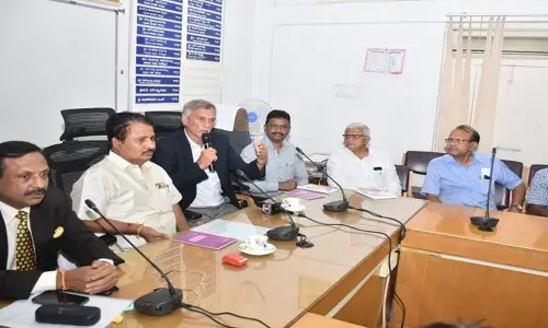 Former cricketer Roger Binny with MUDA officials in Mysuru on Wednesday