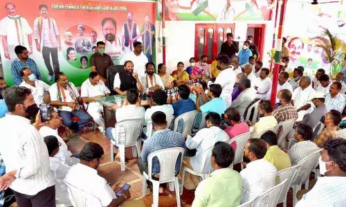 Nalgonda MP Uttam Kumar Reddy along with party leader Ram Reddy Damoder Reddy addressing the media in Suryapet on Friday