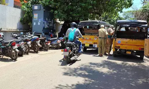 The first lane at Dwarakanagar facing traffic bottlenecks frequently due to lack of parking space in Visakhapatnam
