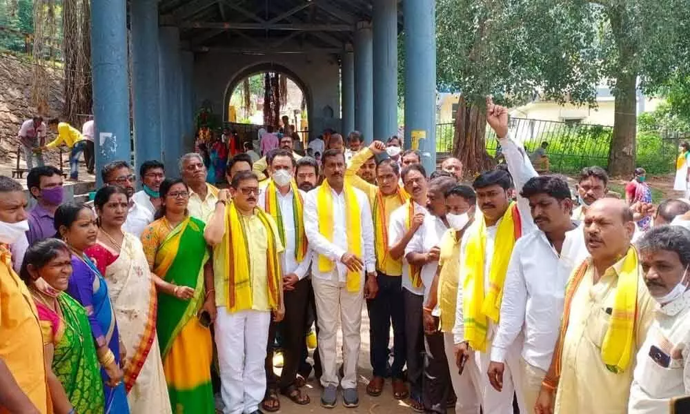 TDP leaders staging a protest at Simhachalam temple on Saturday demanding Samprokshanam of the temple premises