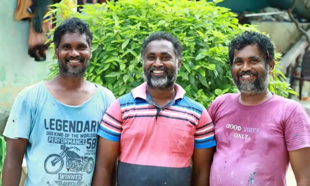 Makers of myriad forms of Ganesha Babu (right) with his two brothers Ram and Lakshman