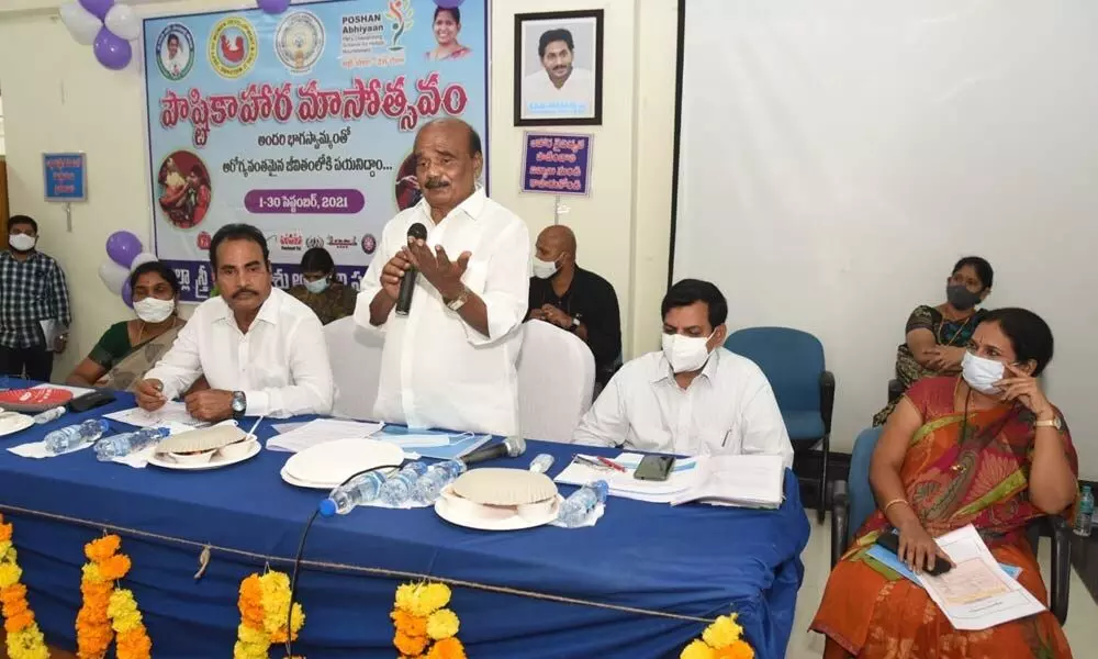 MP N Reddappa speaking at a programme held at ZP Meeting Hall in Chittoor on Saturday. MLA A Srinivasulu and others are also seen.