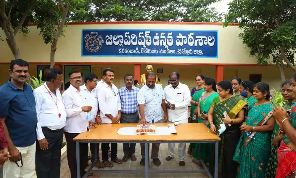 Headmaster T Anand and the other staff celebrating the Teachers Day at Karakambadi ZP High School on Friday