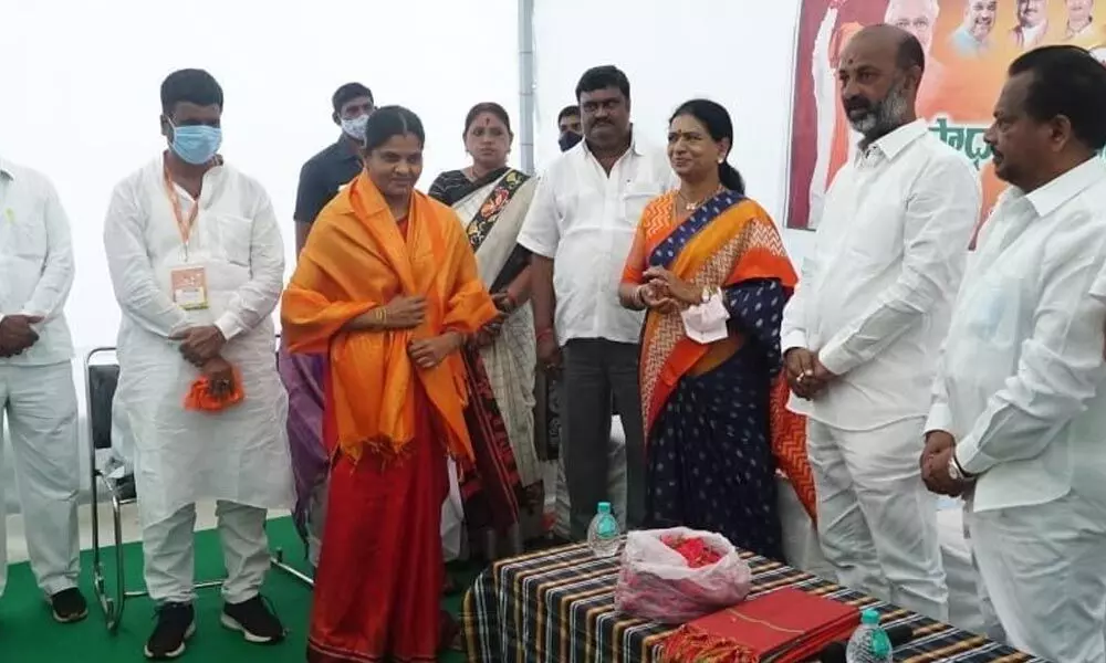 BJP State president Bandi Sanjay Kumar felicitating a teacher on Teachers’ Day at Mandapalli camp office on Sunday