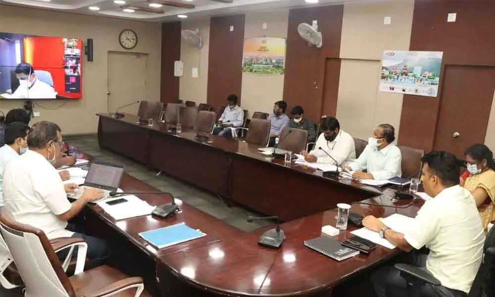 Municipal Commissioner P S Girisha addressing the Smart City Board meeting at the municipal office in Tirupati on Monday