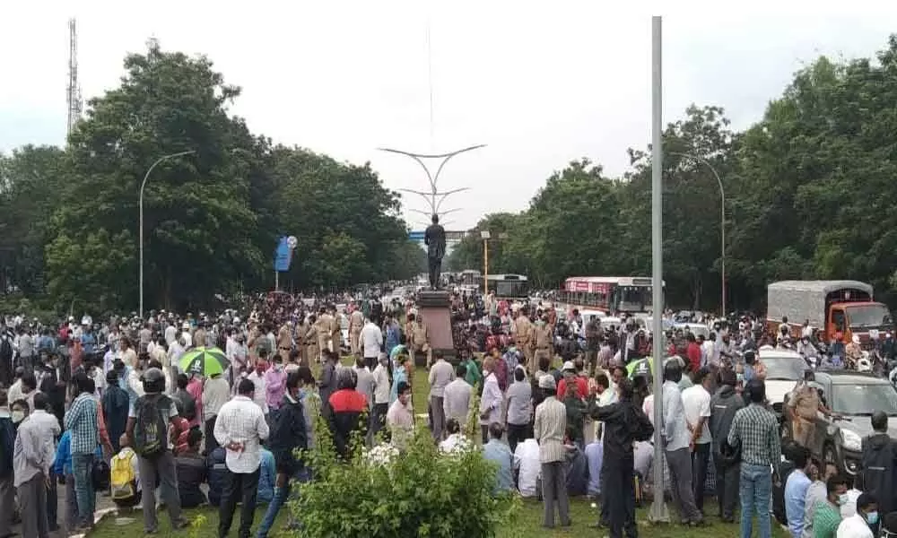 A large number of people gathered at a protest, ignoring physical distancing norms in Visakhapatnam