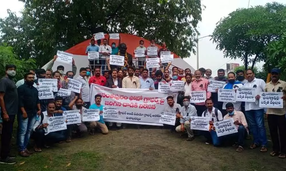 Association of Professional Photographers and Videographers staging a protest in Visakhapatnam on Monday