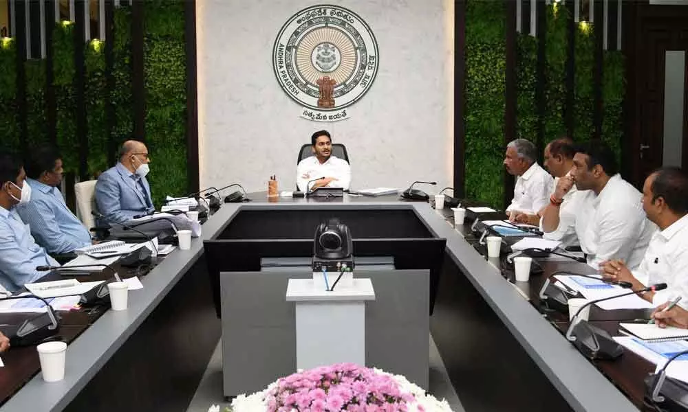 Chief Minister Y S Jagan Mohan Reddy holding a review meeting on roads, ports and airports at his camp office in Tadepalli on Monday