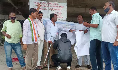 AICC Member Bakka Judson during a signature campaign held in Hanumakonda on Monday