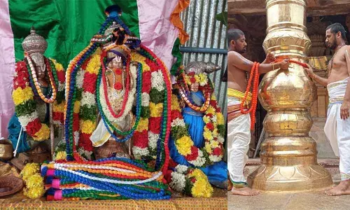 Deities adorned with Pavitramala at Sri Kodandarama Swamy temple at Vontimitta in YSR Kadapa district; Priests tying the sacred Pavitramala to the Dwajasthambham on the second day of Pavithrotsavam at Sri Kodandarama Swamy temple at Vontimitta in YSR Kadapa district on Wednesday