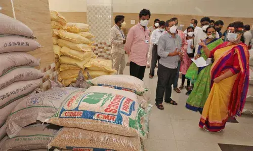 TTD JEO verifying the stock register of a Covid Care Centre during her inspection on Wednesday. JEO inspecting the stock room at a centre