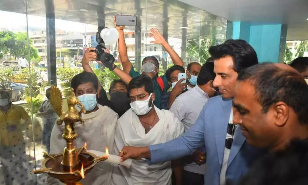 Bollywood actor Sonu Sood inaugurating a hospital in Vijayawada on Thursday