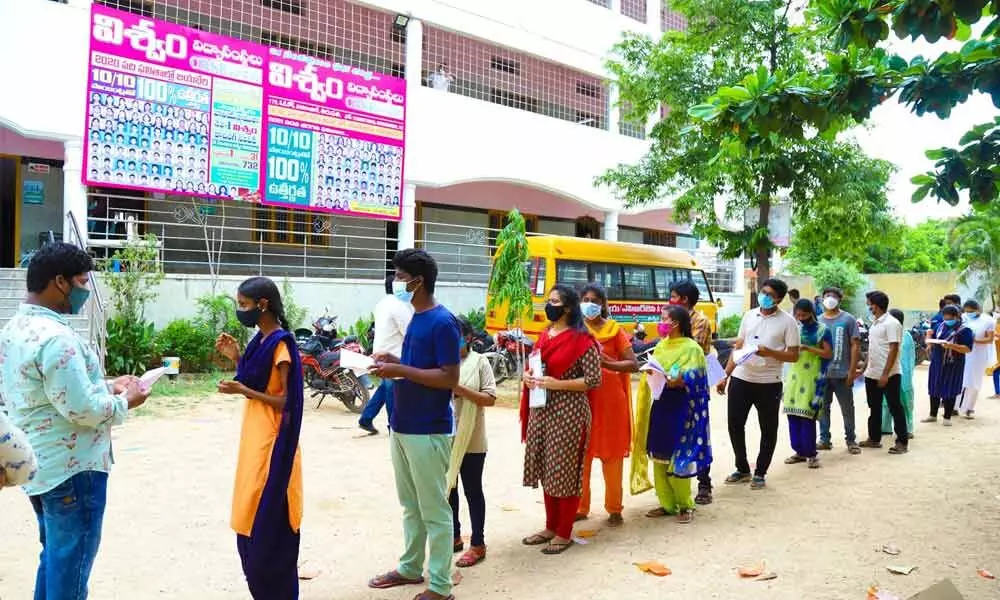 Students attending NEET at Jeeva Kona in Tirupati on Sunday