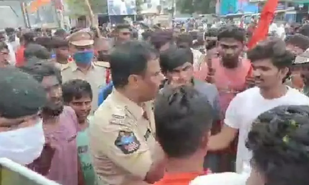 Ganesh immersion organisers picking up an argument with police in Gudur on Sunday