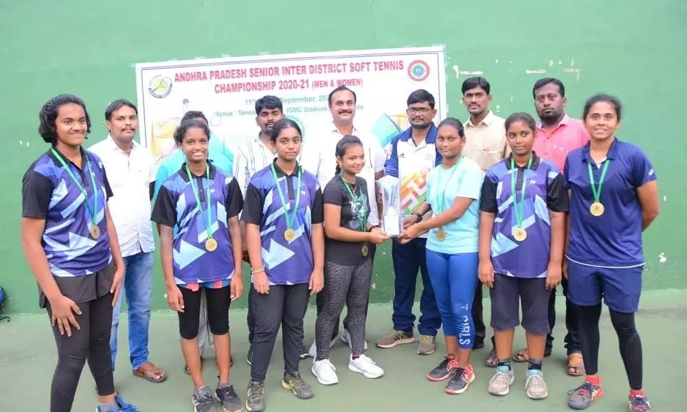 Krishna district Soft Tennis girls team with medals at Indira Gandhi Municipal Corporation (IGMC) stadium in Vijayawada on Sunday